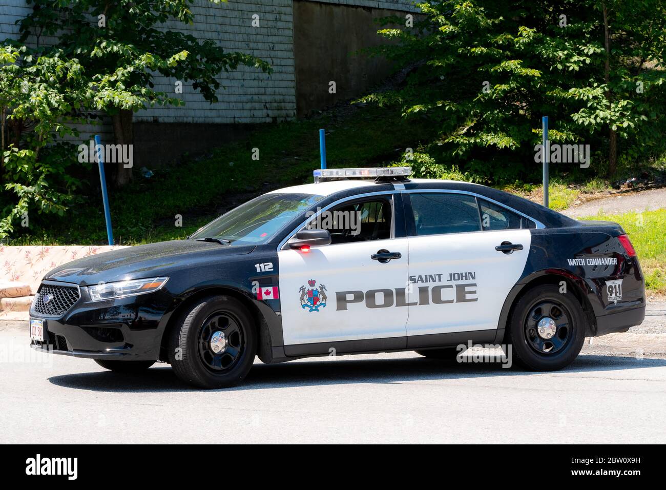 Saint John, N.-B., Canada - le 24 juillet 2019 : une voiture de police bloque une rue de la ville. Cette voiture est désignée comme appartenant au COMMANDANT DE LA MONTRE. La rue était fade Banque D'Images