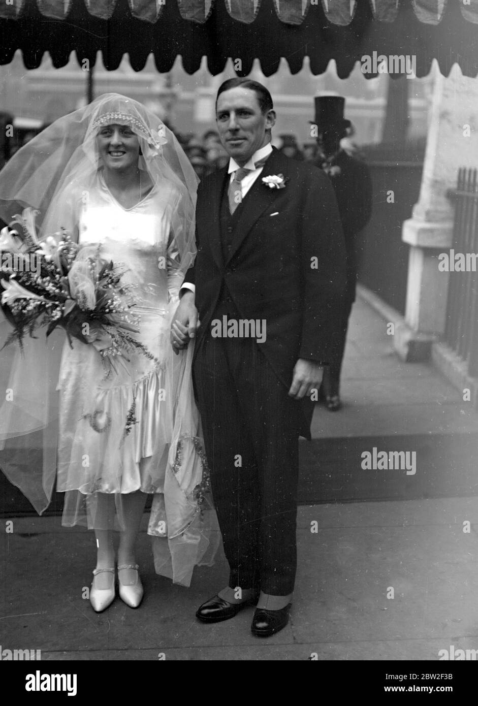 Mariage de M. J.M.H. Wilson et Mlle Mary E. Richards à St Margaret's, Westminster. 19 décembre 1927 Banque D'Images