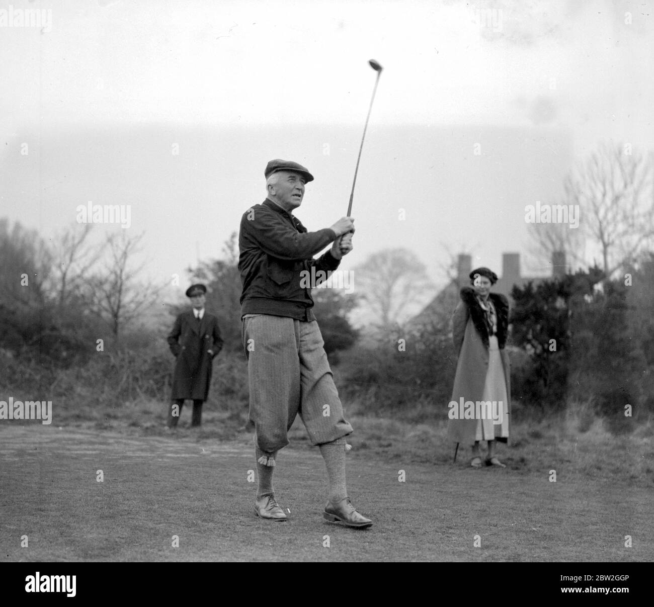Tournoi de golf parlementaire à Walton Heath. Sir John Simon. 1936 Simon, John Allsebrook, Viscount Administrateur et politicien britannique; secrétaire britannique aux affaires étrangères 1931-1935; publié le rapport Simon  1873-1951 Banque D'Images