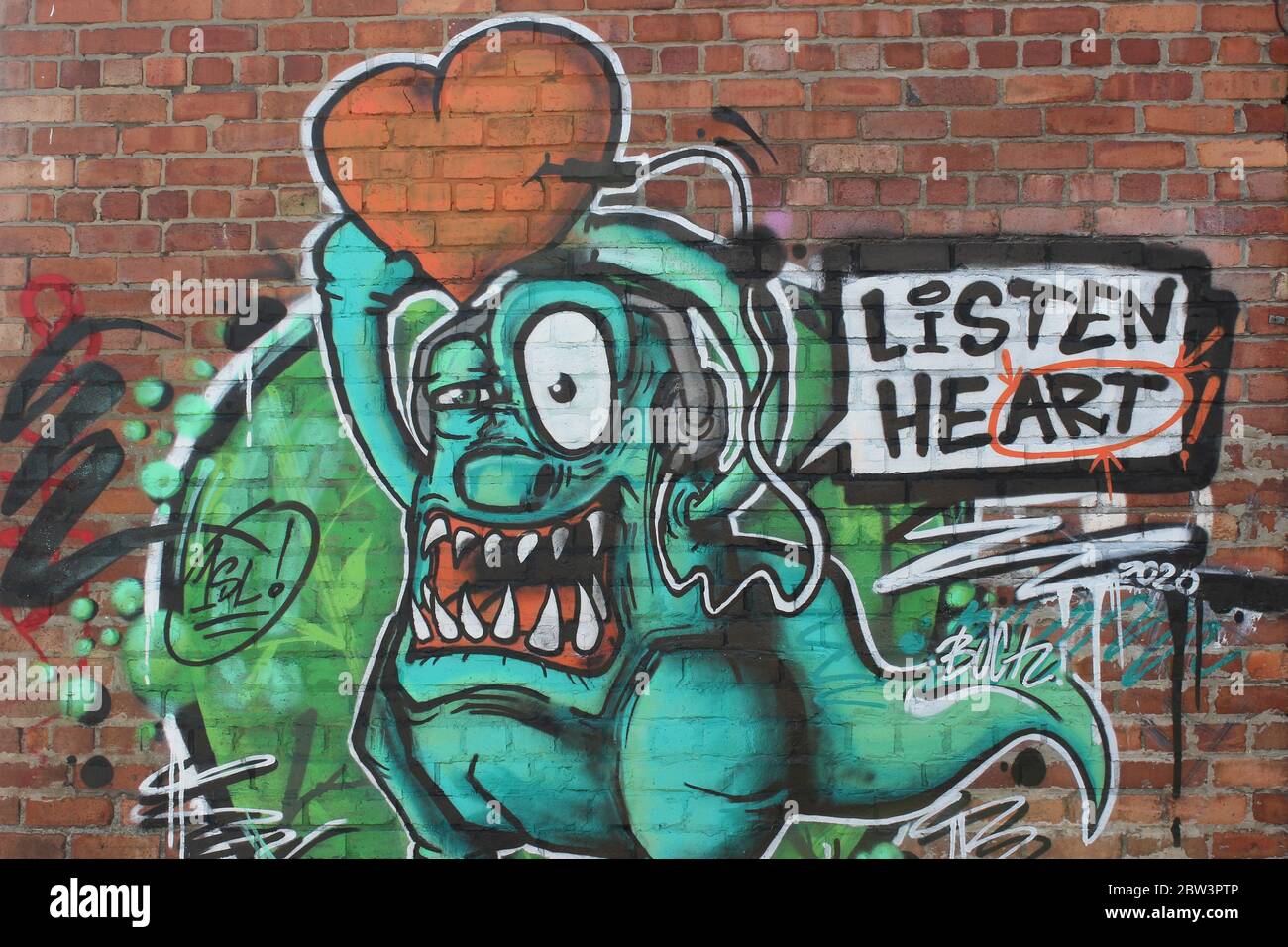 Écoutez votre cœur Graffiti Banque D'Images