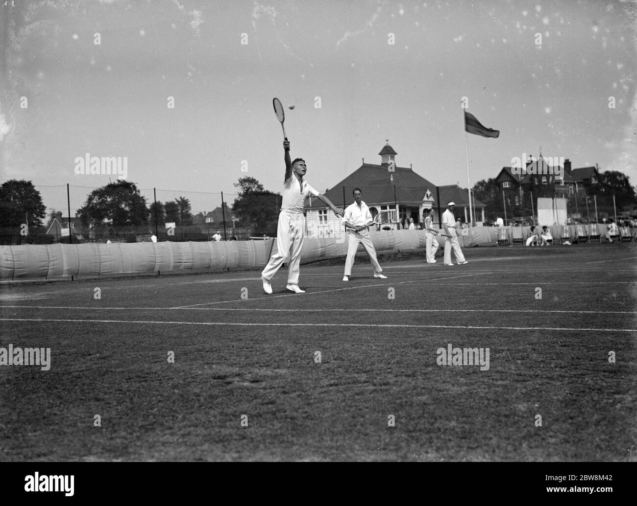 Match de tennis double pour hommes . 1935 Banque D'Images