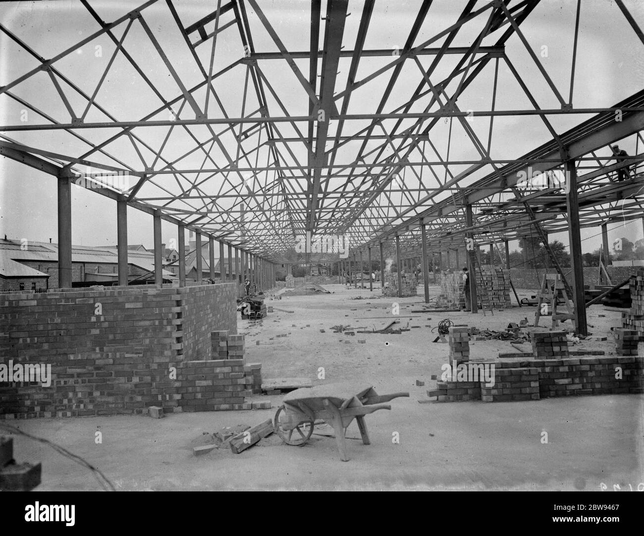L'usine St Helens Cable & Rubber Company Limited est en cours de construction à Slough , Buckinghamshire . Les travaux d'acier sont effectués par Edward Wood & Company . 1938 Banque D'Images