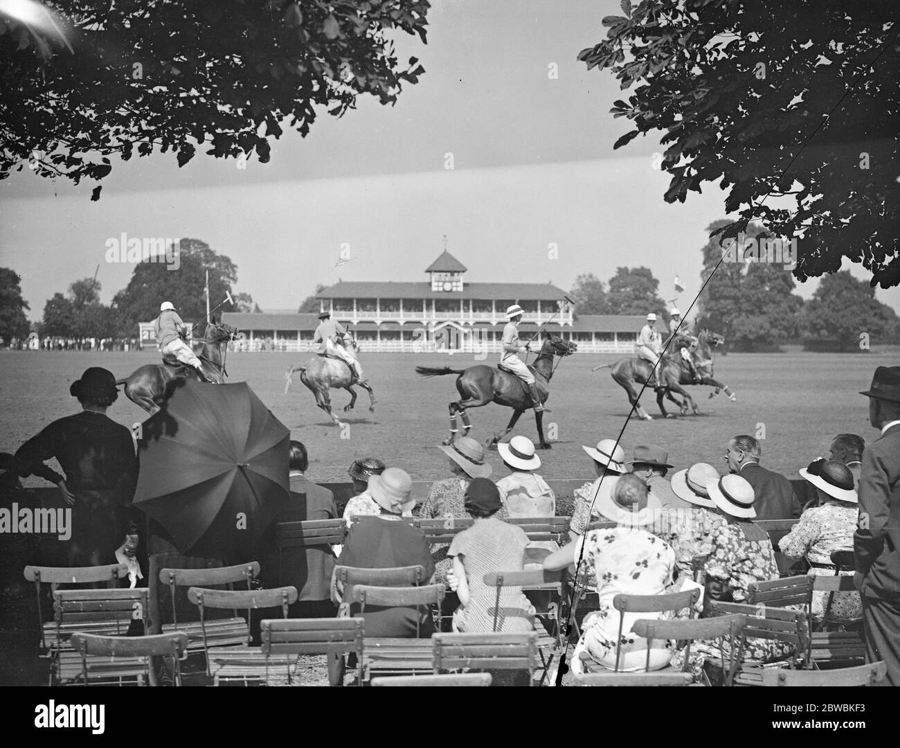 Polo au Ranelagh Club , West London . Le match entre Aurora , une équipe des Etats-Unis , et les knaves dans la finale de la coupe du Couronnement . 9 juillet 1934 Banque D'Images