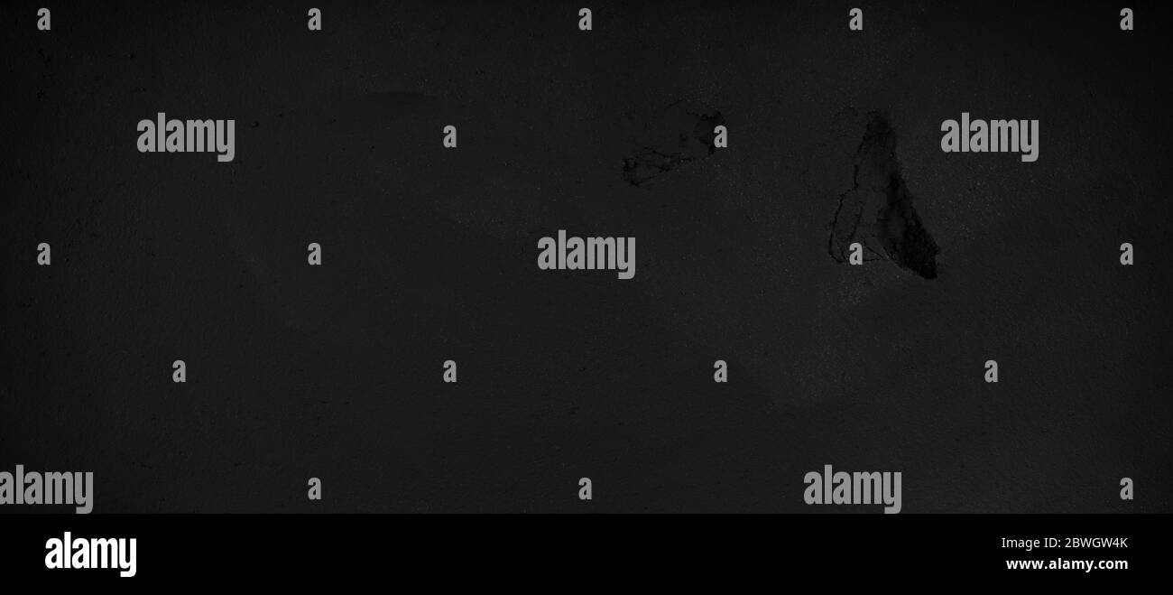 Surface murale panoramique noire, texture murale sombre Banque D'Images