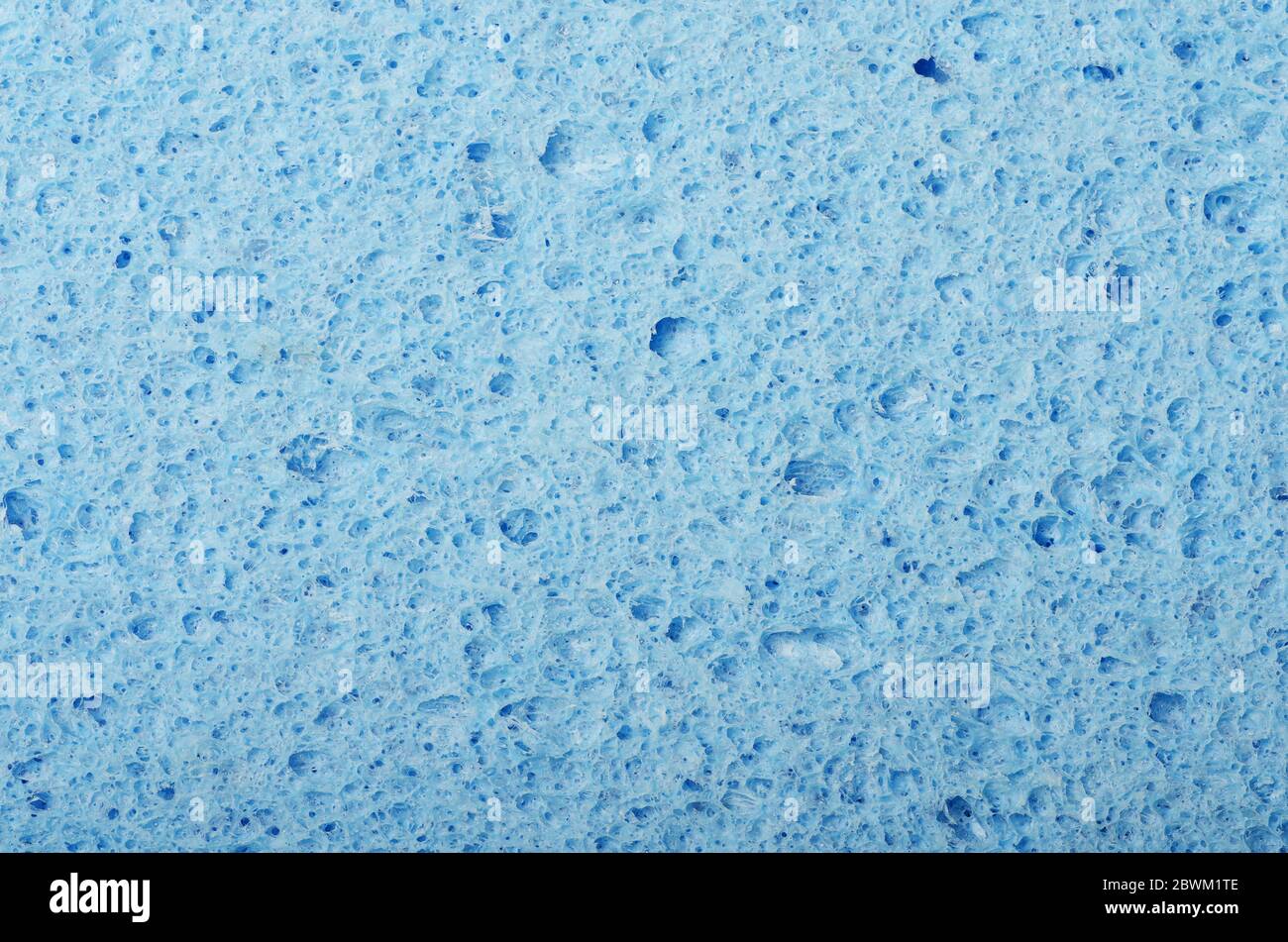 Texture de fond de l'éponge faciale ovale en cellulose bleue Banque D'Images