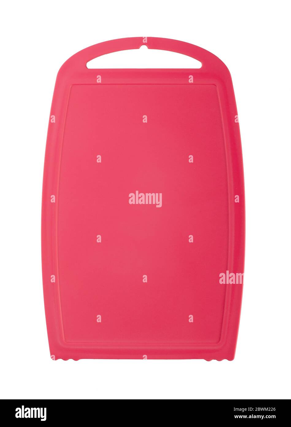 Planche à découper en plastique rose isolée sur fond blanc Banque D'Images