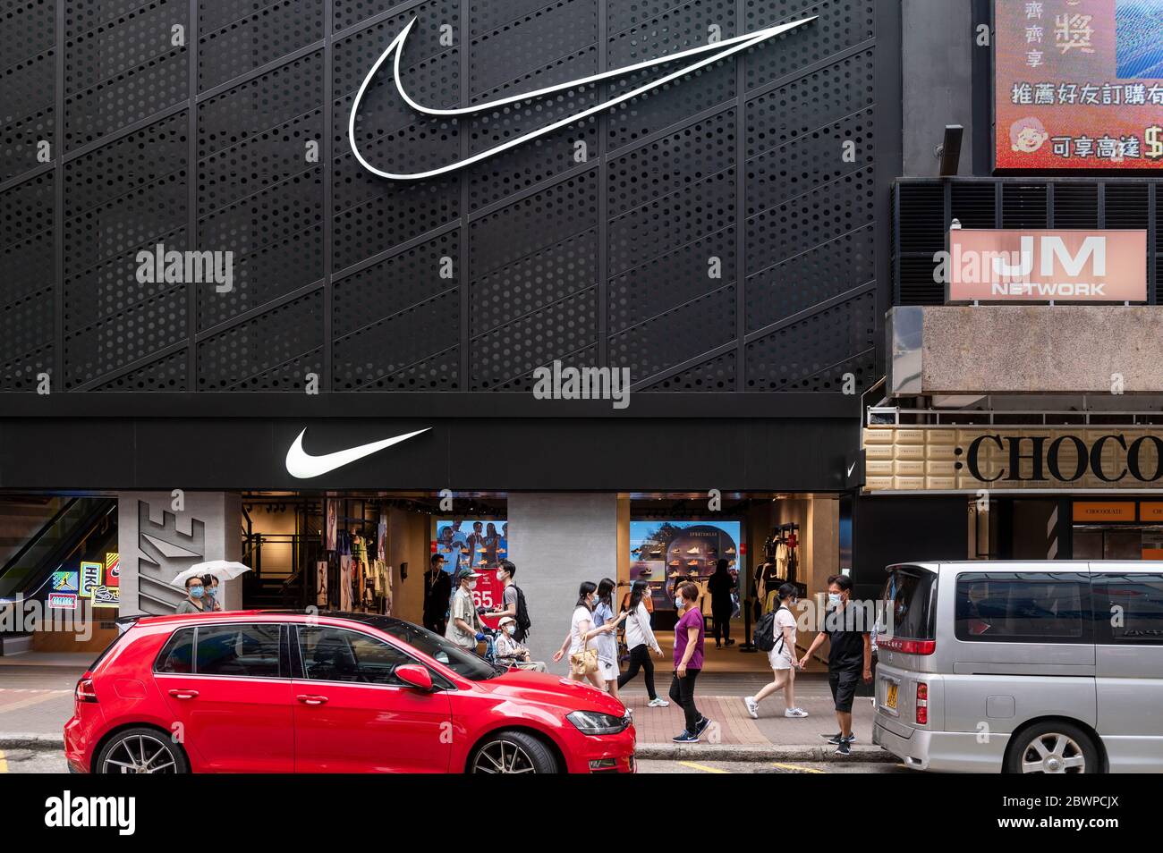 La marque américaine multinationale de vêtements de sport Nike Store et son logo sont visibles à Hong Kong. Banque D'Images