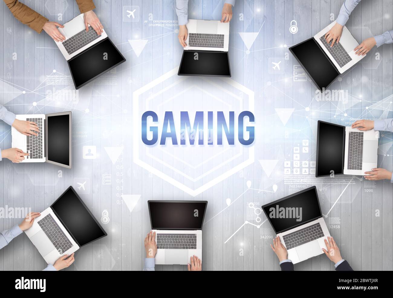 Groupe de personnes occupées travaillant dans un bureau avec inscription DE JEU, concept de technologie moderne Banque D'Images