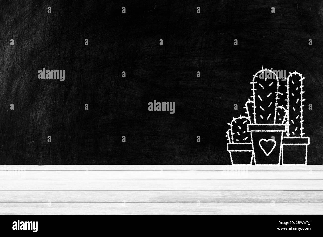 Table en bois blanc avec arbres de cactus dessin sur fond de tableau noir., adapté pour l'affichage du produit. Banque D'Images Table en bois blanc avec arbres de cactus dessin sur fond de tableau noir., adapté pour l'affichage du produit. Banque D'Images