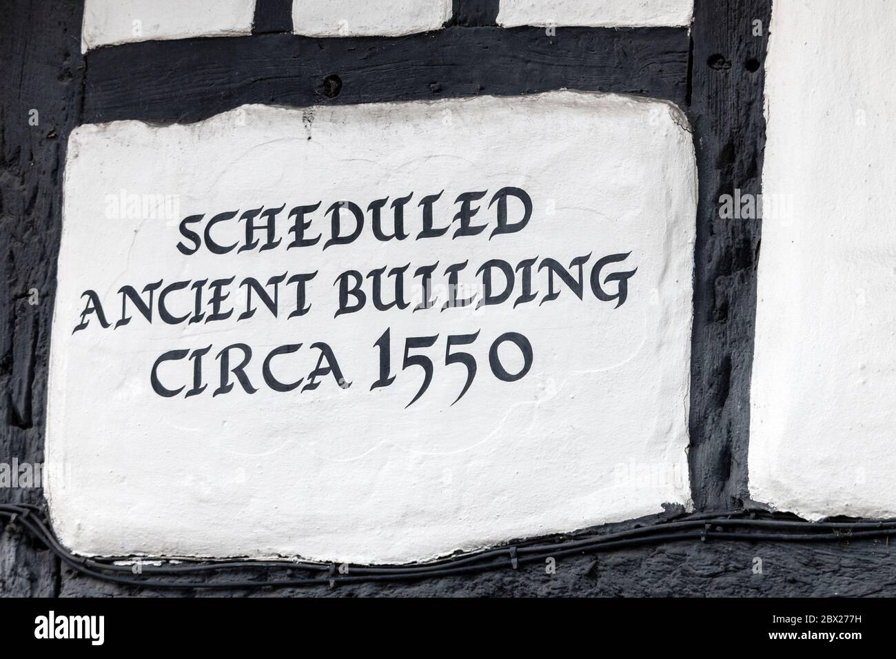 Un bâtiment de toit de chaume, situé dans le Calledâ le Thatchâ est un restaurant construit en 1550. Il est sur la Basse haute rue dans la ville de marché de Thame dans Oxfordshire, BRI Banque D'Images