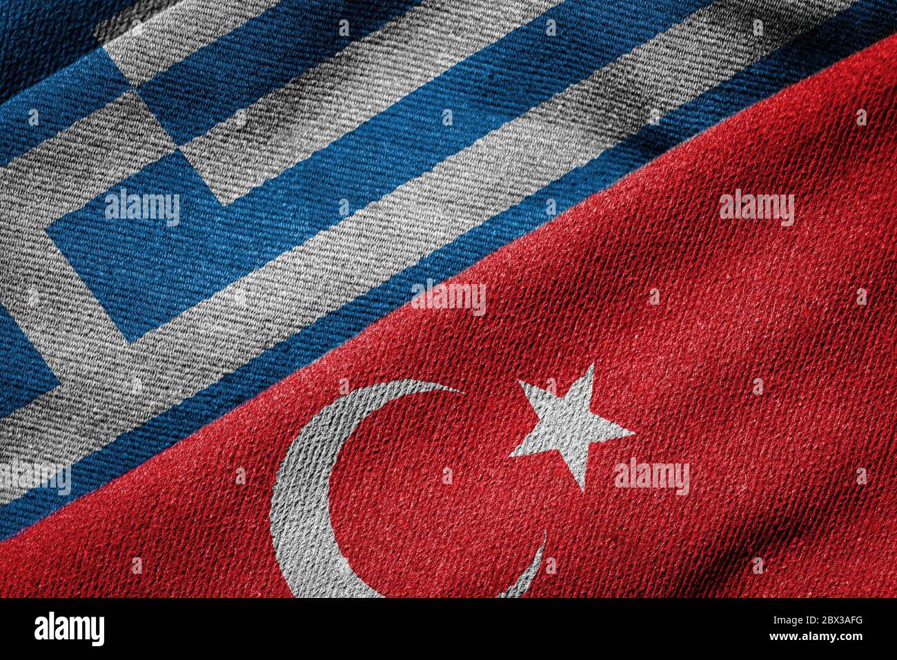 Rendu 3D des drapeaux de la Grèce et de la texture tissée de dinde. Motif textile détaillé et thème grunge. Concept des relations entre les deux c Banque D'Images