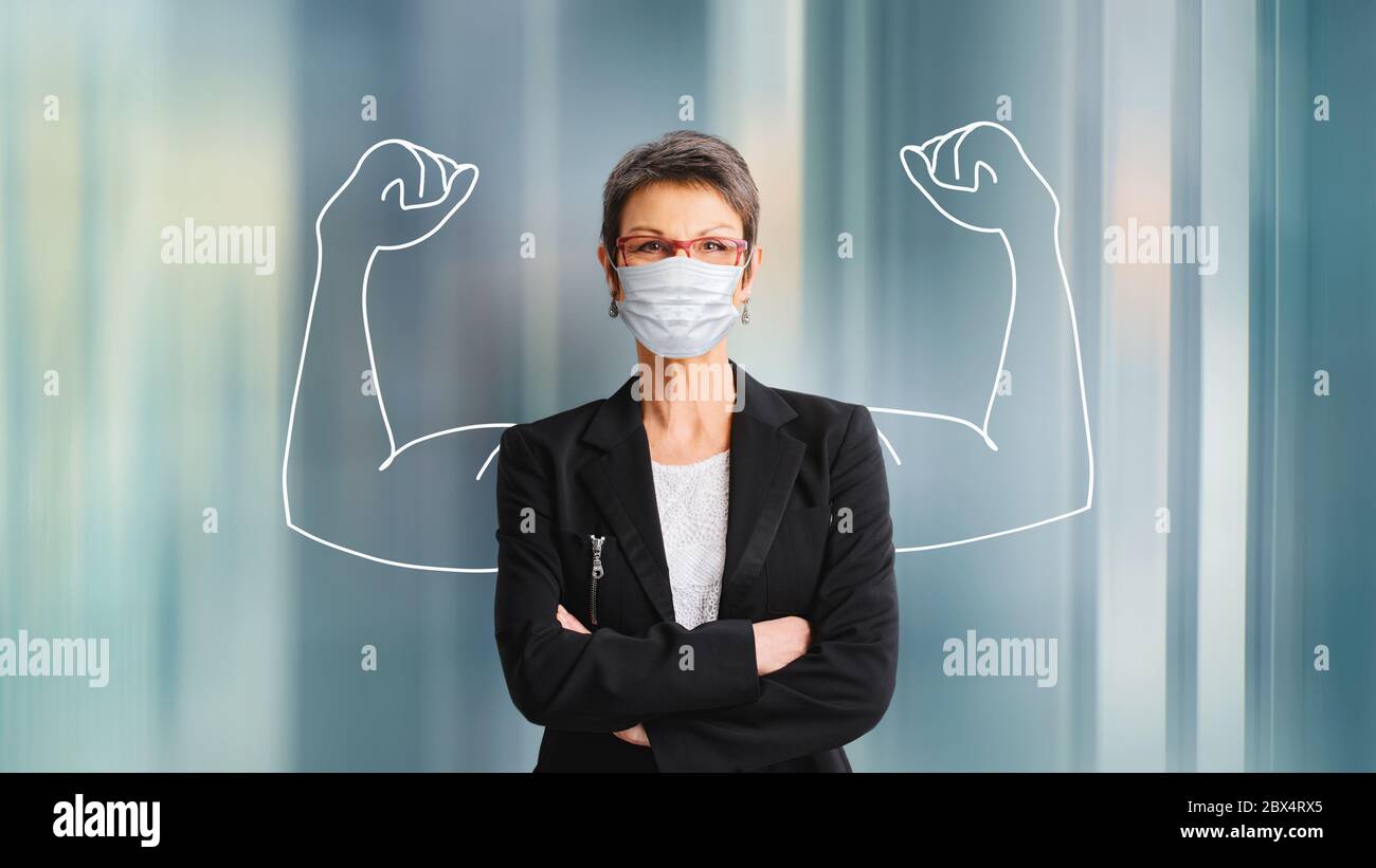 Une femme adulte dans un masque respiratoire. Concept de succès Banque D'Images