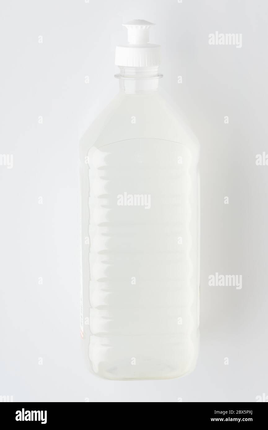 Flacon en plastique blanc transparent isolé sur fond de studio Banque D'Images