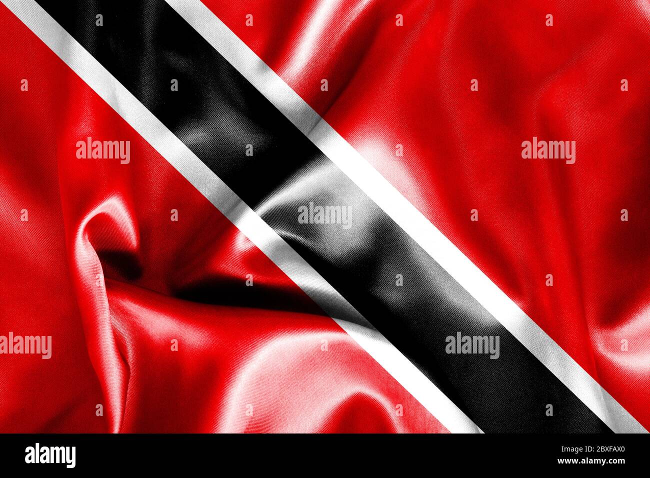 La texture du drapeau de Trinité-et-Tobago s'est froissée et s'est émiettée de lumière et d'ombres Banque D'Images