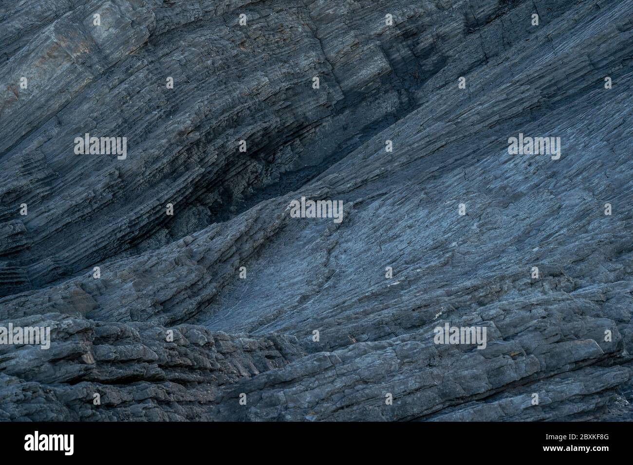 Formation ondulée étonnante de texture de fond de roche. Géologie la science de la terre. L'étude des pierres Banque D'Images