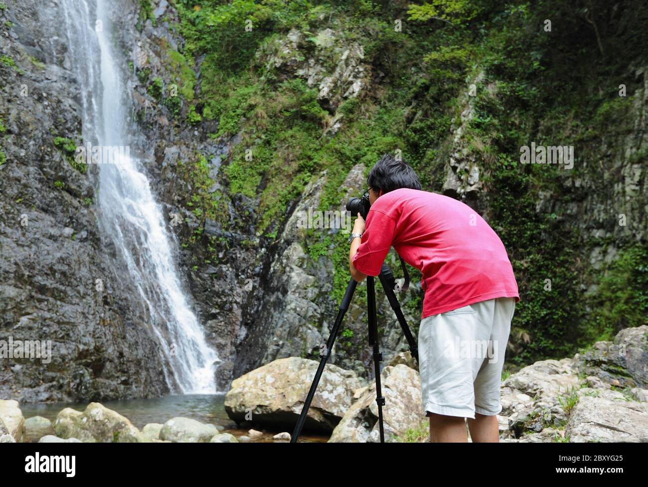 La prise de photo de cascade photographe Banque D'Images