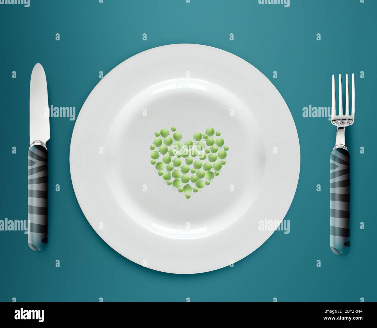 pois verts sur l'assiette Banque D'Images