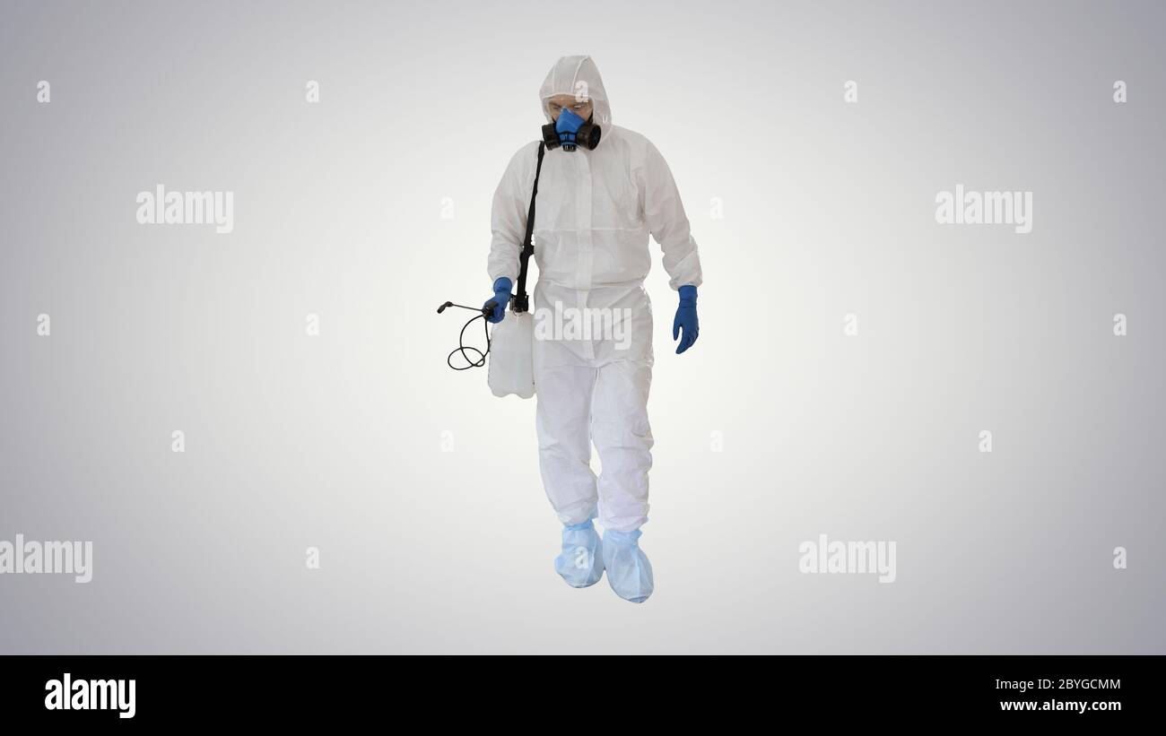Virologue en marche uniforme et en désinfection de la zone sur fond de gradient. Banque D'Images