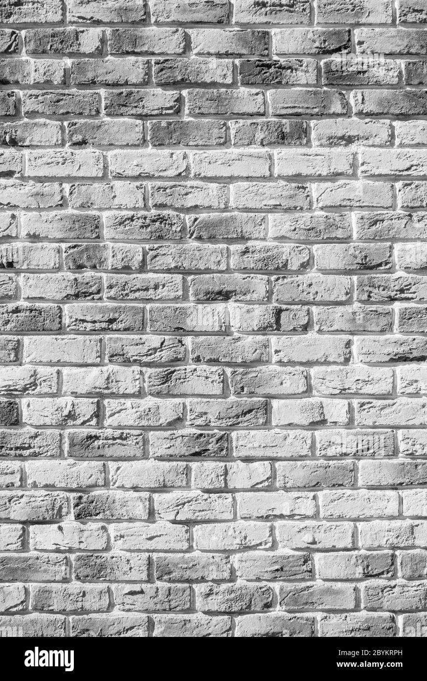 Mur en briques noir et blanc fait à la main, loft. Mur en brique simple et haut de gamme. Fond ou texture qualitatif. Banque D'Images