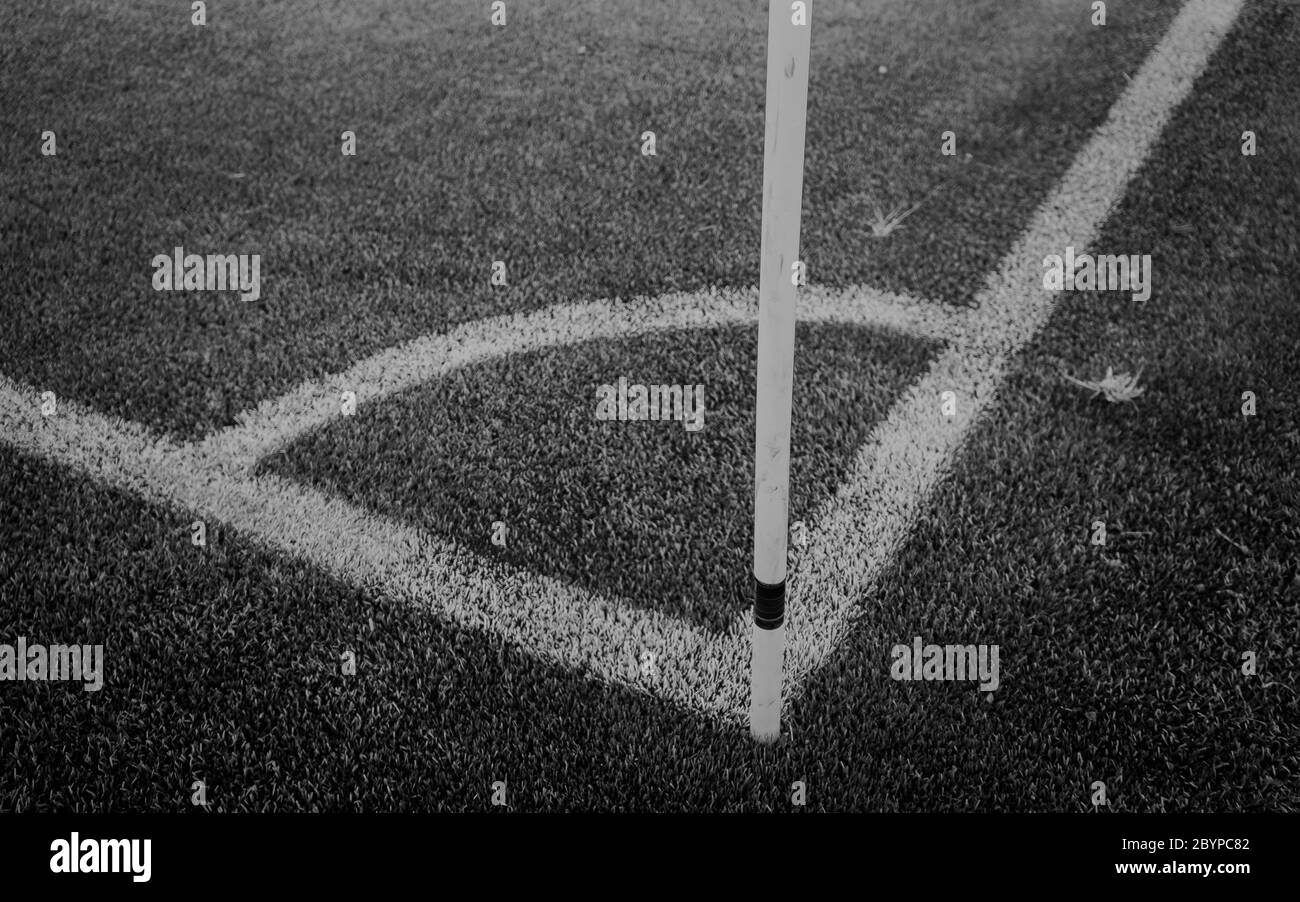Jouer coin de terrain, Green grass texture de football ou de soccer. Coin ligne fond blanc marqué Banque D'Images