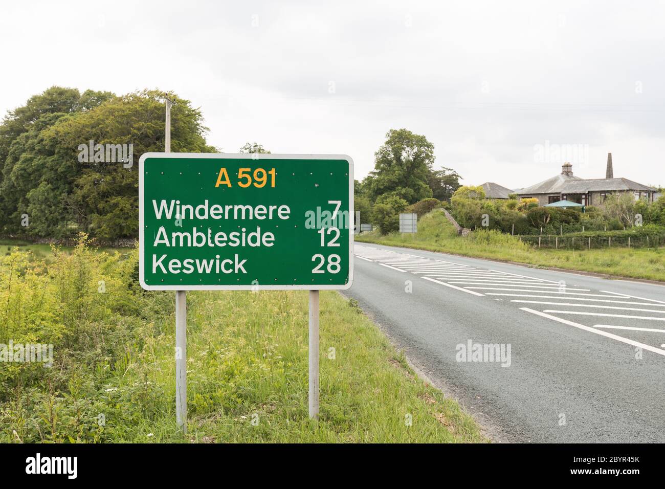 Visitez le Lake District en toute sécurité au panneau à l'entrée du parc national juste à côté de Kendal. Inscrivez-vous lorsque le gouvernement voyage en voiture à haute voix au Royaume-Uni Banque D'Images