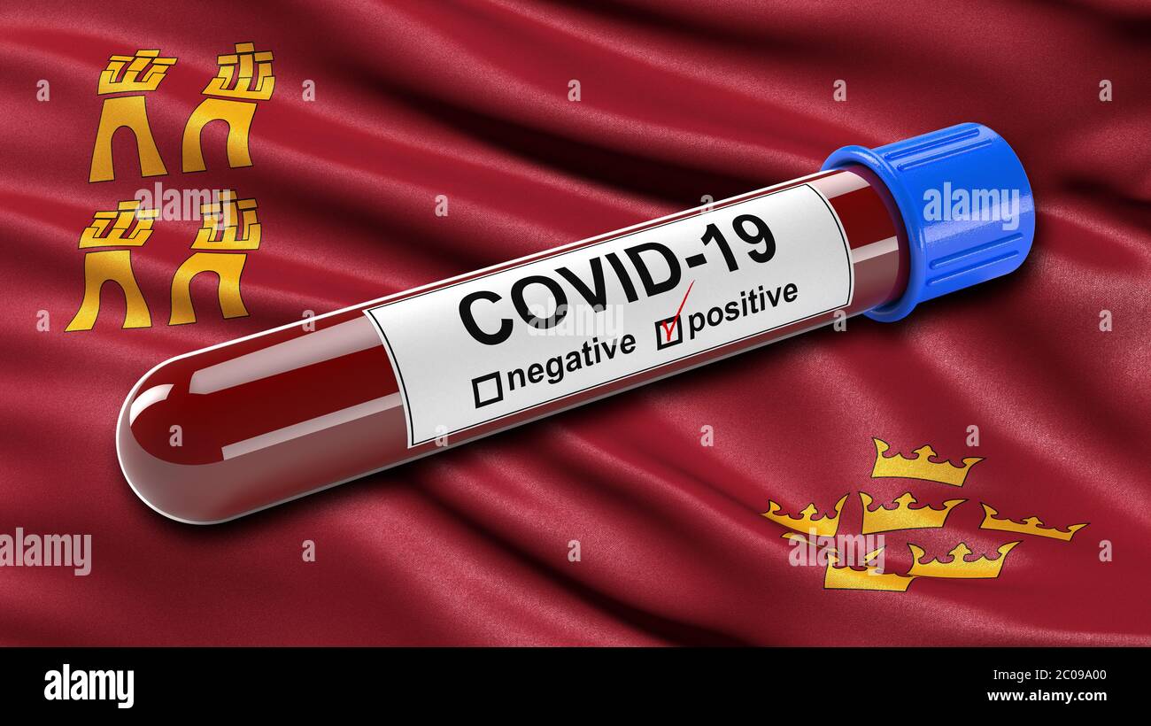 Drapeau de la région de Murcie agitant dans le vent avec un tube à essai positif Covid-19. Banque D'Images