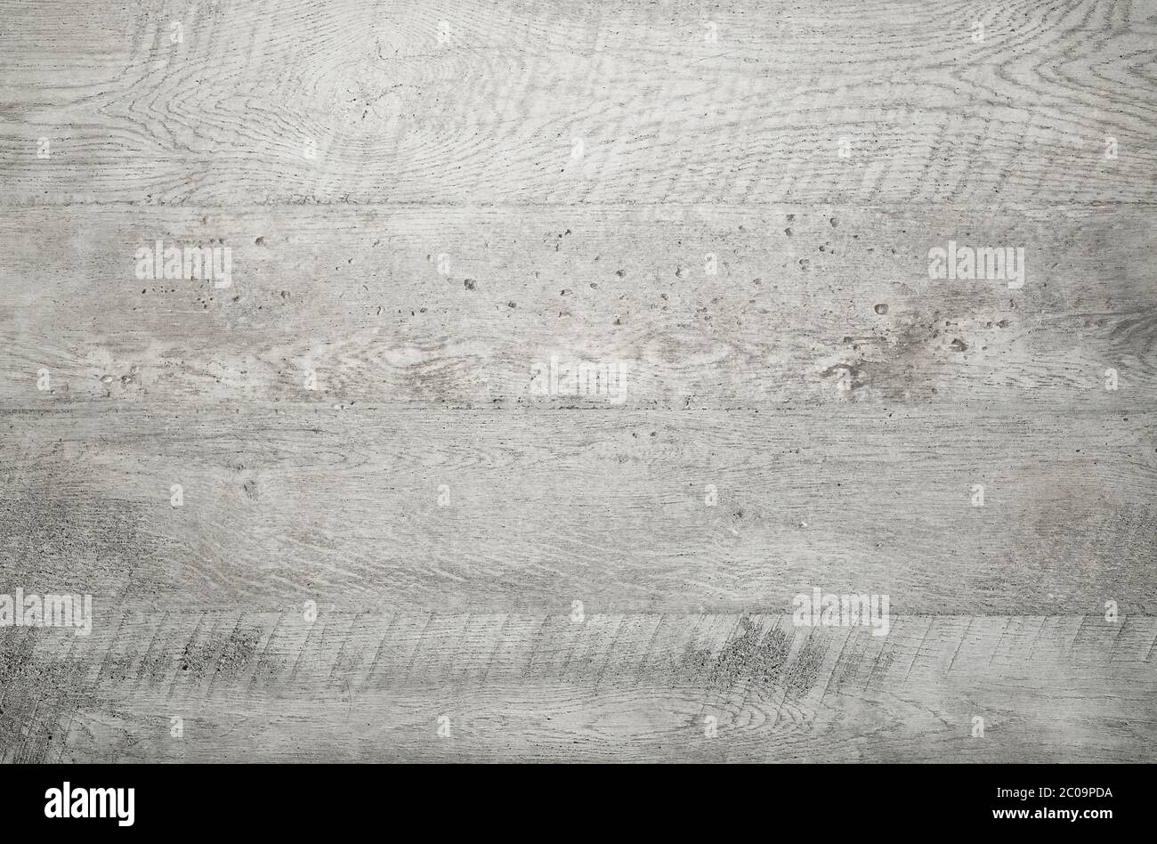 Arrière-plan en bois gris, vue du dessus. Les planches en bois sont empilées horizontalement et ont un aspect usé. Cette surface serait idéale pour la conception Banque D'Images