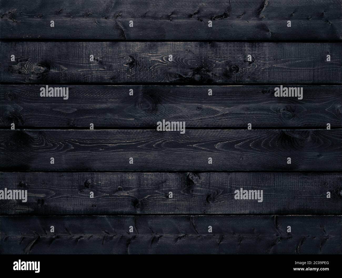 Dark Black wood texture background (vue de dessus). Les planches en bois sont empilées à l'horizontale et ont un look usé. Cette surface serait grand comme Banque D'Images