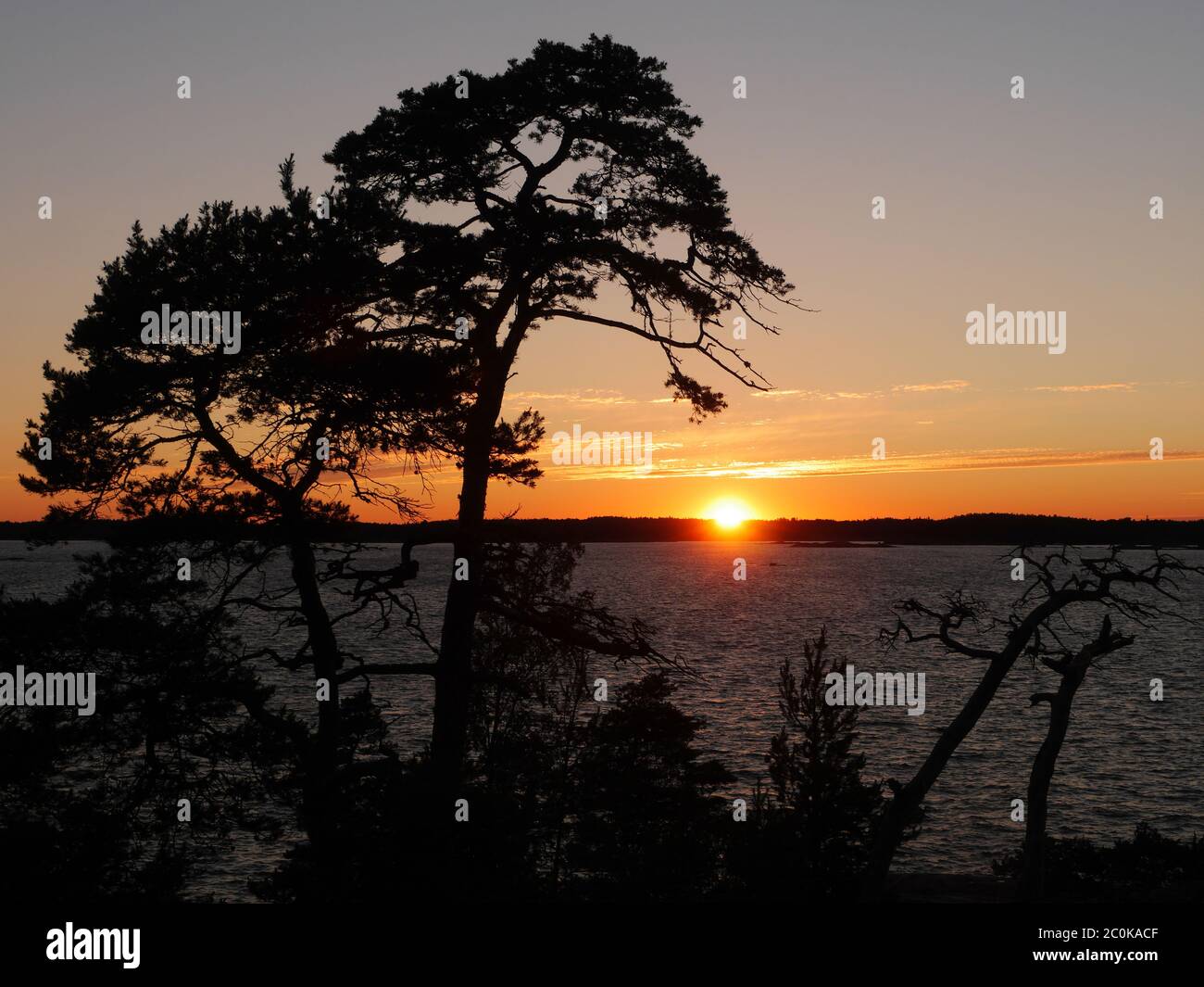 paysage côtier de finlande avec coucher de soleil Banque D'Images