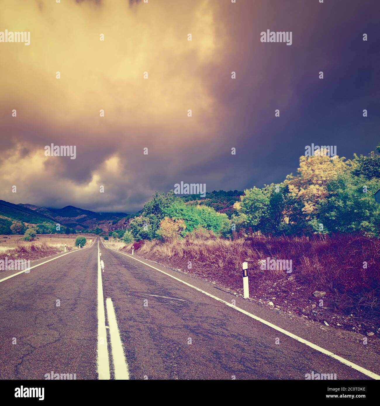 Route au coucher du soleil Banque D'Images