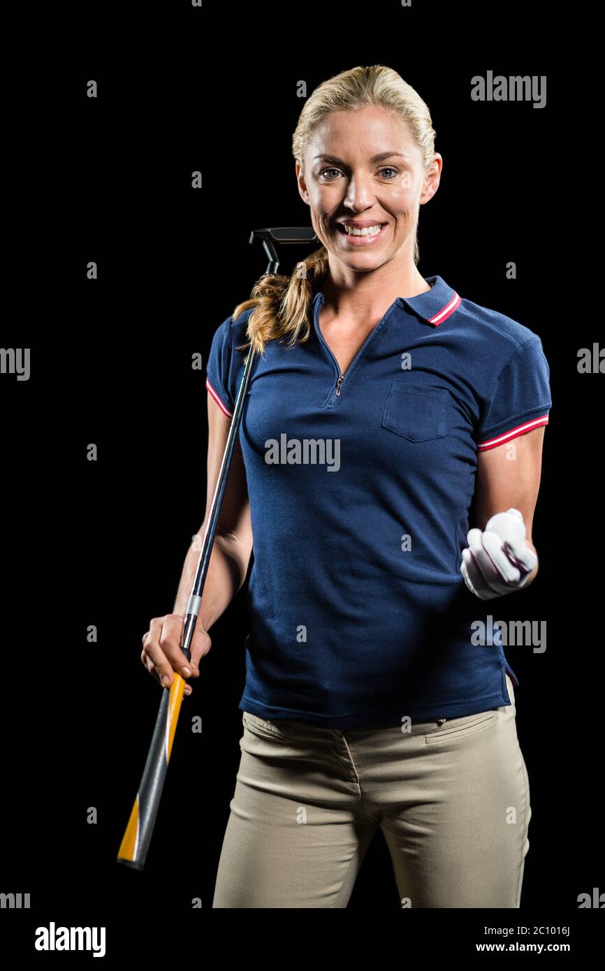 Portrait de joueur de golf tenant une balle de golf et club de golf Banque D'Images