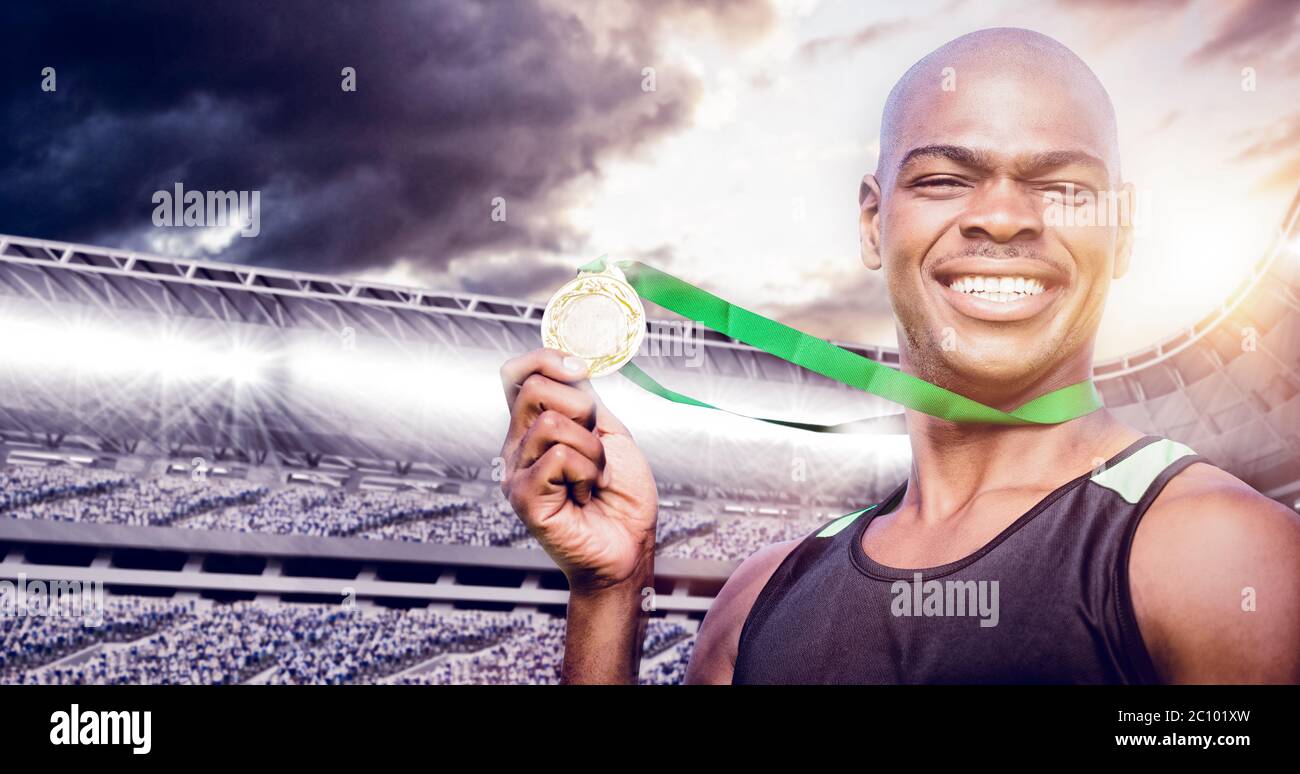 Image composite de portrait de sportif pose avec sa médaille Banque D'Images