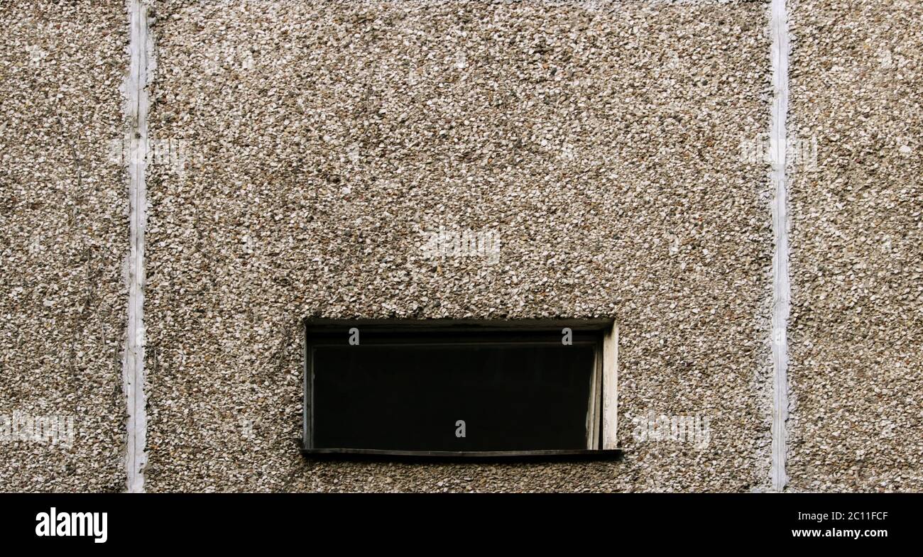 fenêtre et texture de bloc grise d'un immeuble de grande hauteur Banque D'Images