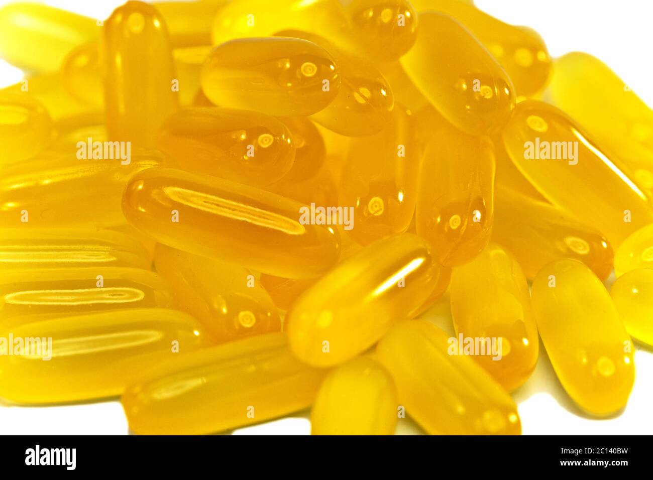 Capsules de médecine liquide jaunes Banque D'Images