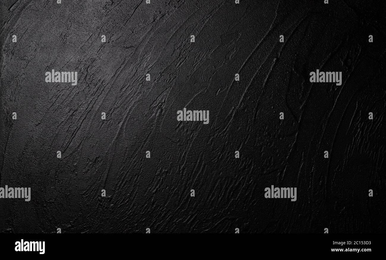 Texture en pierre noire, fond en ardoise sombre Banque D'Images