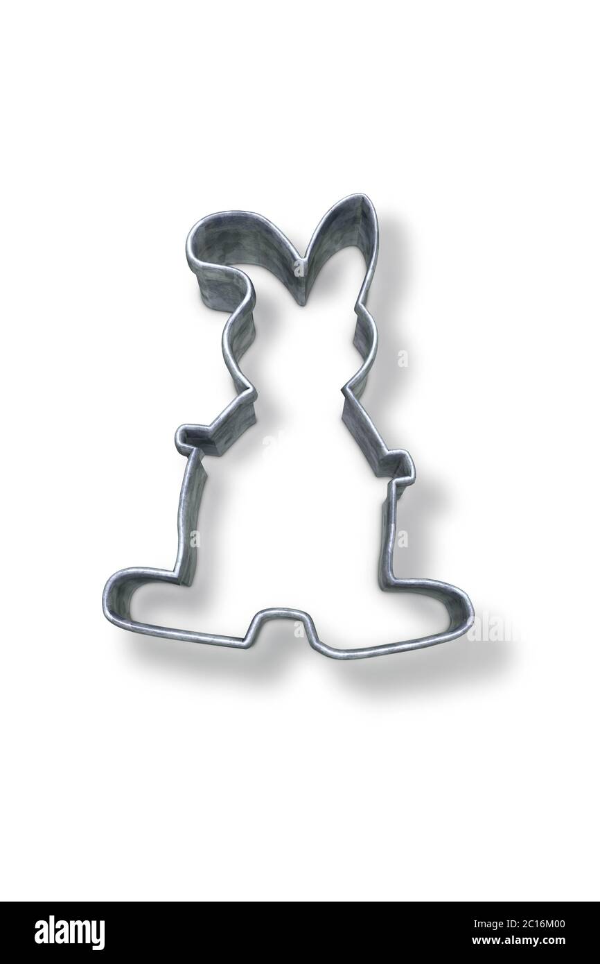 Couteau à pâtisserie en forme de lapin sur surface blanche Banque D'Images