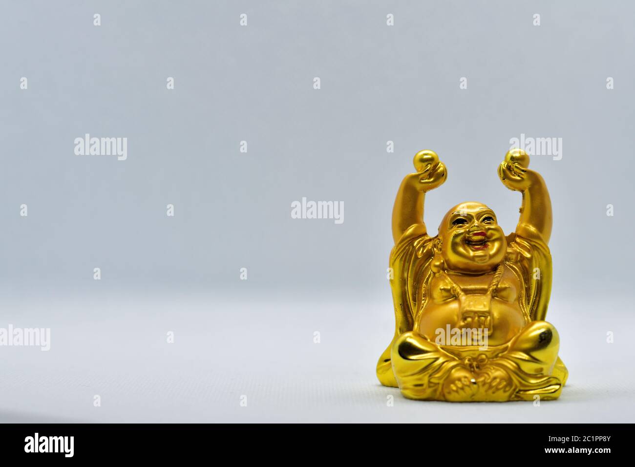 Le Bouddha riant est un symbole de bonheur, de contentement et de prospérité. Il est appelé « Budai » en chinois. Banque D'Images