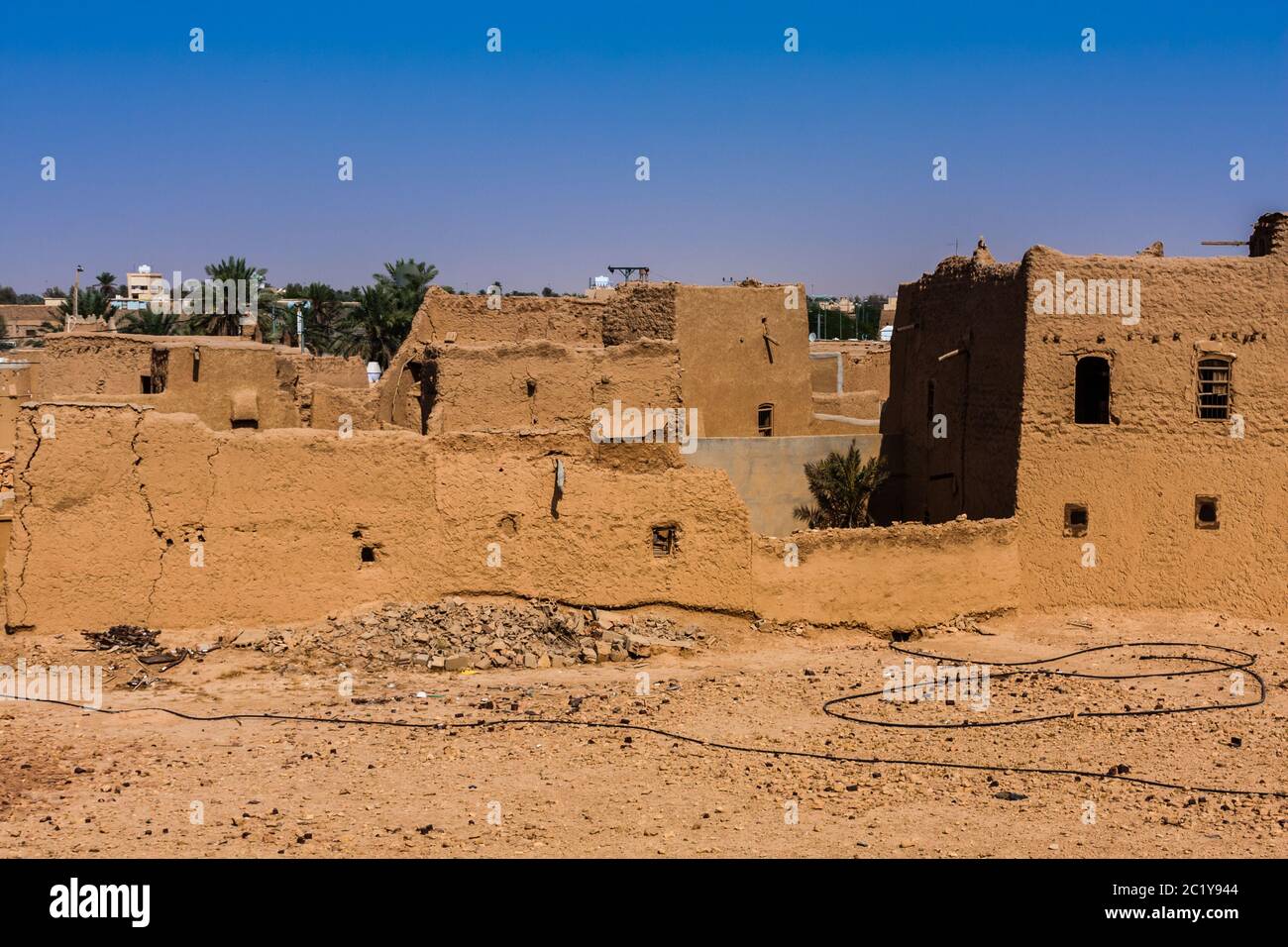 Les maisons traditionnelles en brique de boue en ruines et partiellement restaurées à Al Majmaah, en Arabie Saoudite Banque D'Images