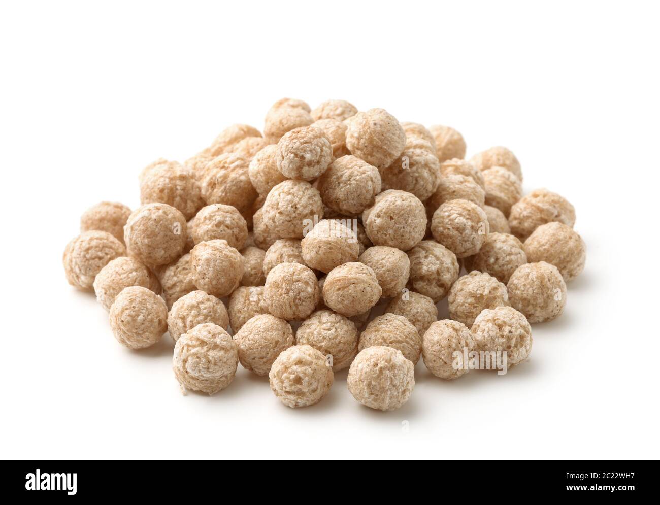 Pile de boules de son de céréales isolées sur blanc Banque D'Images