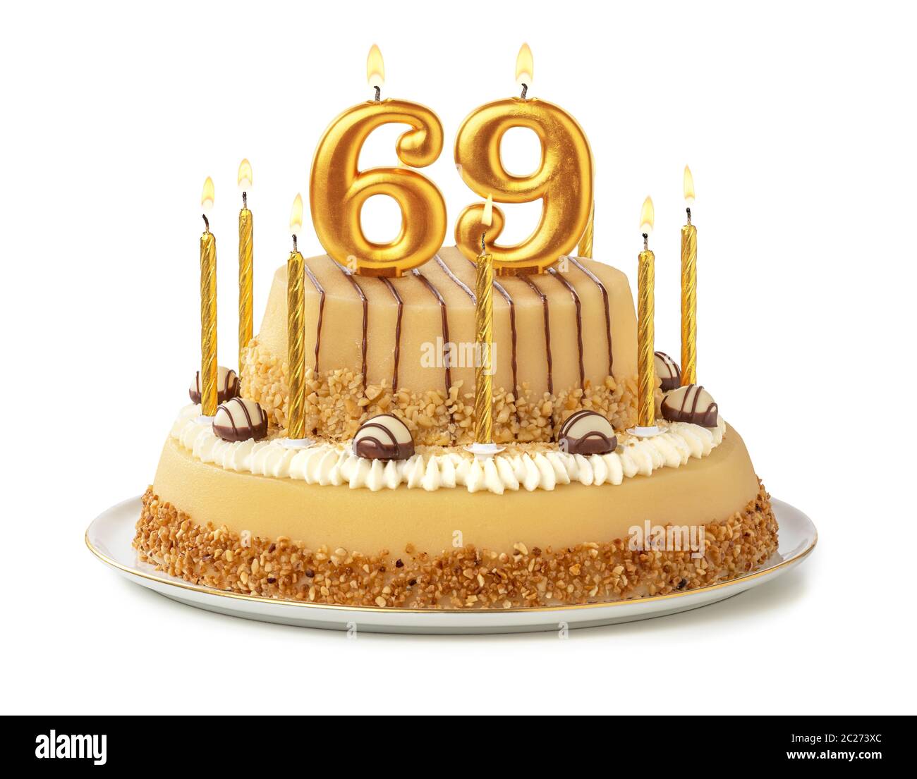Gâteau de fête avec des bougies d'or - Numéro 69 Banque D'Images