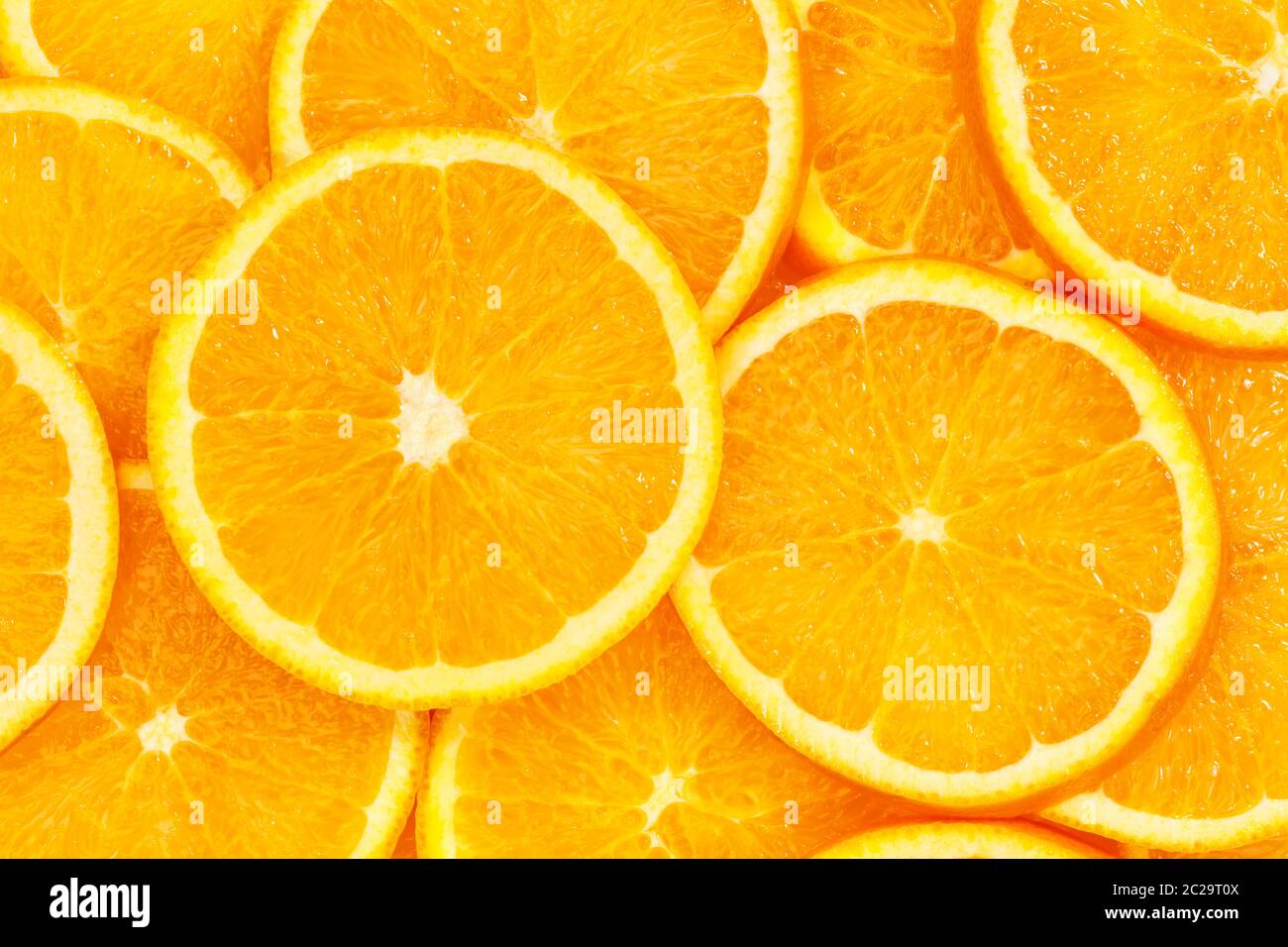 Agrumes Oranges tranches orange fond alimentaire collection origines de fruits frais Banque D'Images