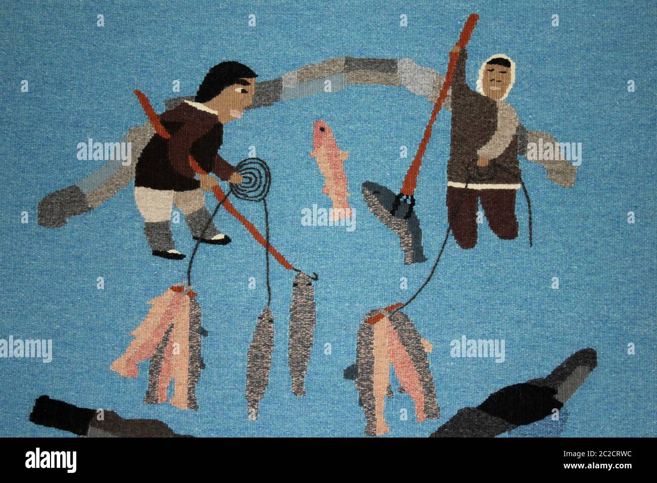 Textile représentant la pêche à la lance des chasseurs inuits, Iqaluit, Nunavut, Canada Banque D'Images