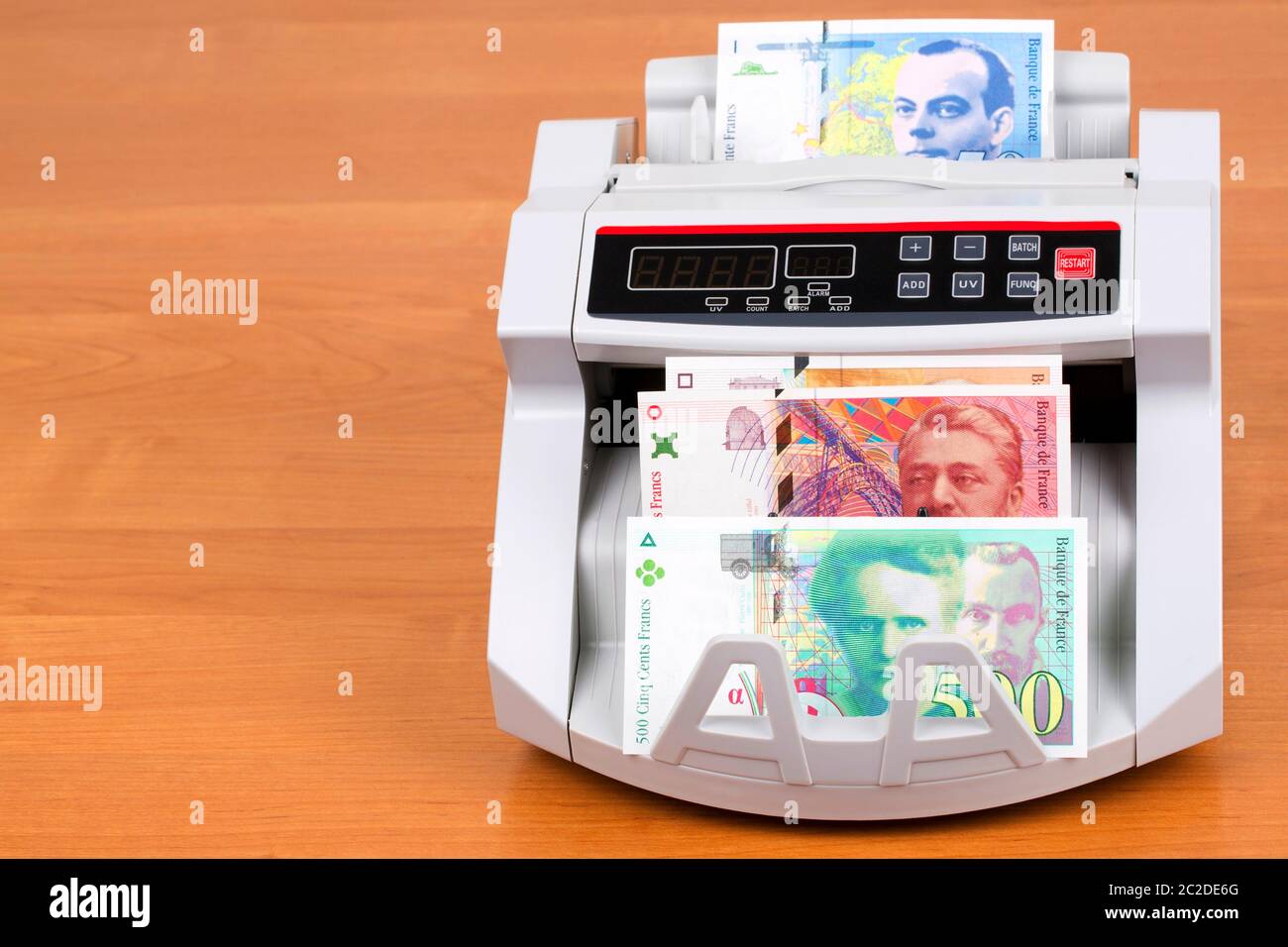 Francs français dans une machine de comptage Banque D'Images