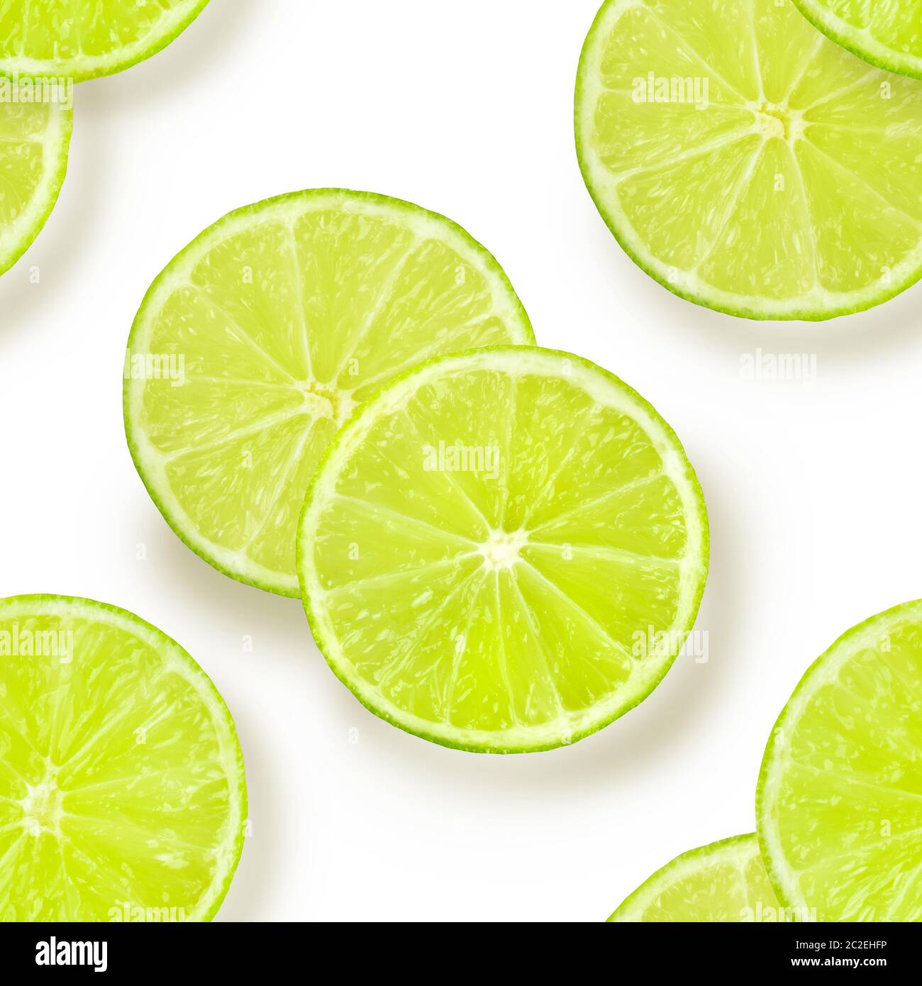 Un modèle uniforme de tranches de lime sur un fond blanc, un fruité vibrant répéter l'impression d'agrumes Banque D'Images