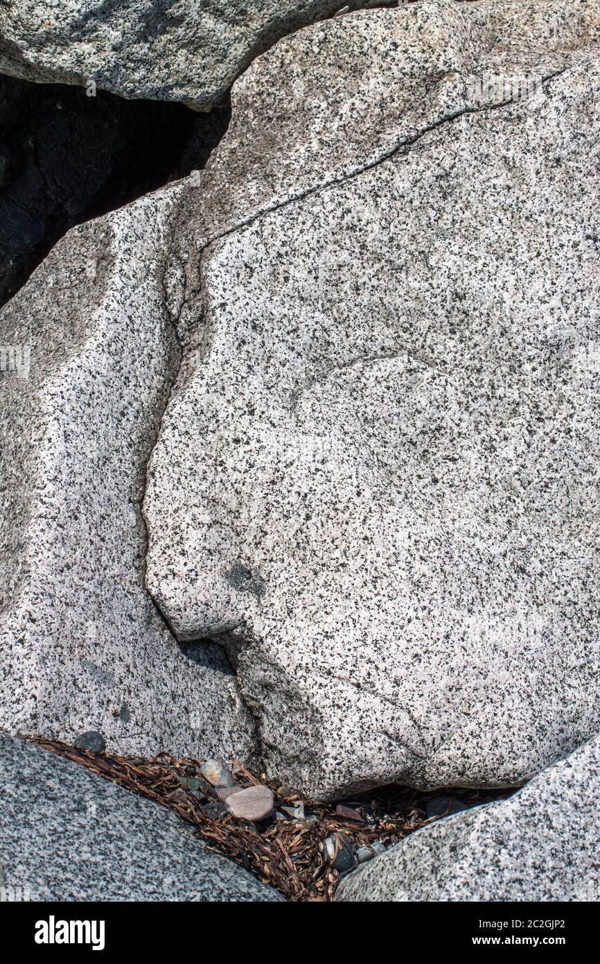 Roche photographiée de manière à ce qu'elle ressemble au profil du visage. Banque D'Images