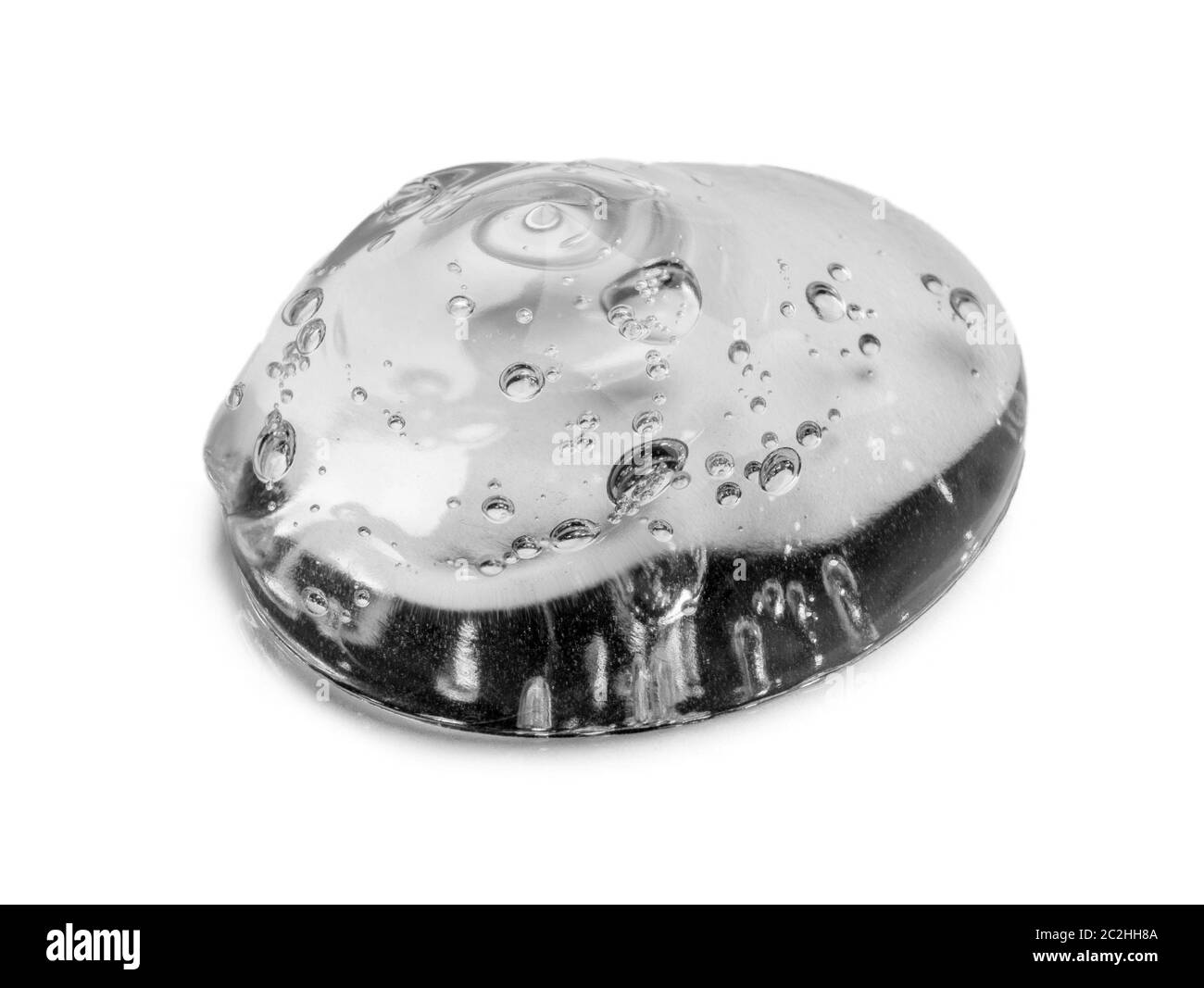 Texture de gel crème claire et cosmétique pressée Isolated sur fond blanc. Photo en gros plan de la goutte transparente du produit de soin de la peau Banque D'Images