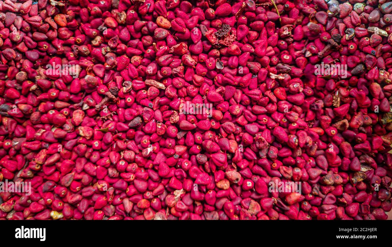 Grains annatto, fond urugueux, texture. Banque D'Images