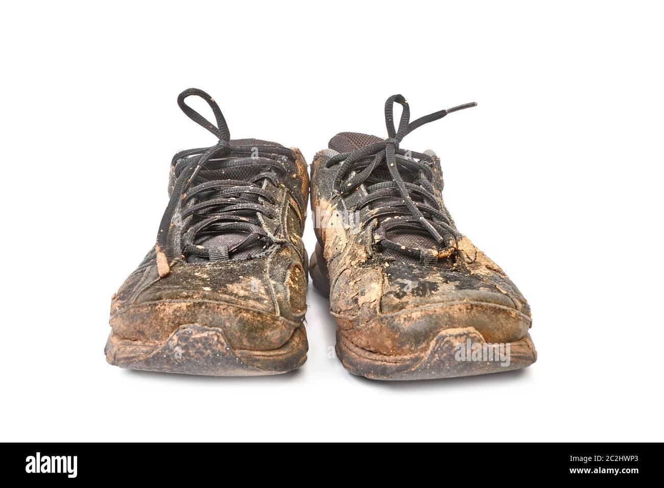 Paire de chaussures boueuses recouvertes de boue Photo Stock - Alamy