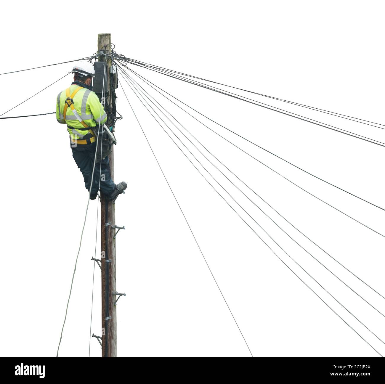 Lineman isolé (ou technicien de ligne) qui fixe UNE ligne téléphonique Banque D'Images