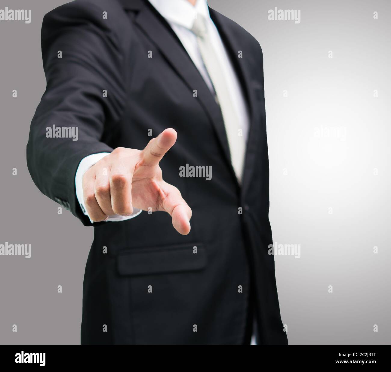 Businessman standing posture show part isolé sur fond gris plus Banque D'Images